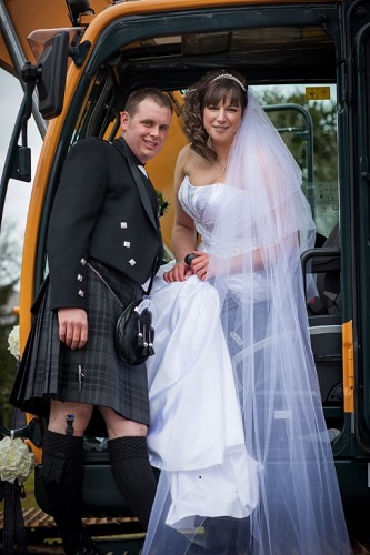 Christopher "Slewie" Warden and his lovely wife Pauline said "Yes, I do" in his Hyundai R140LC-9 excavator. 